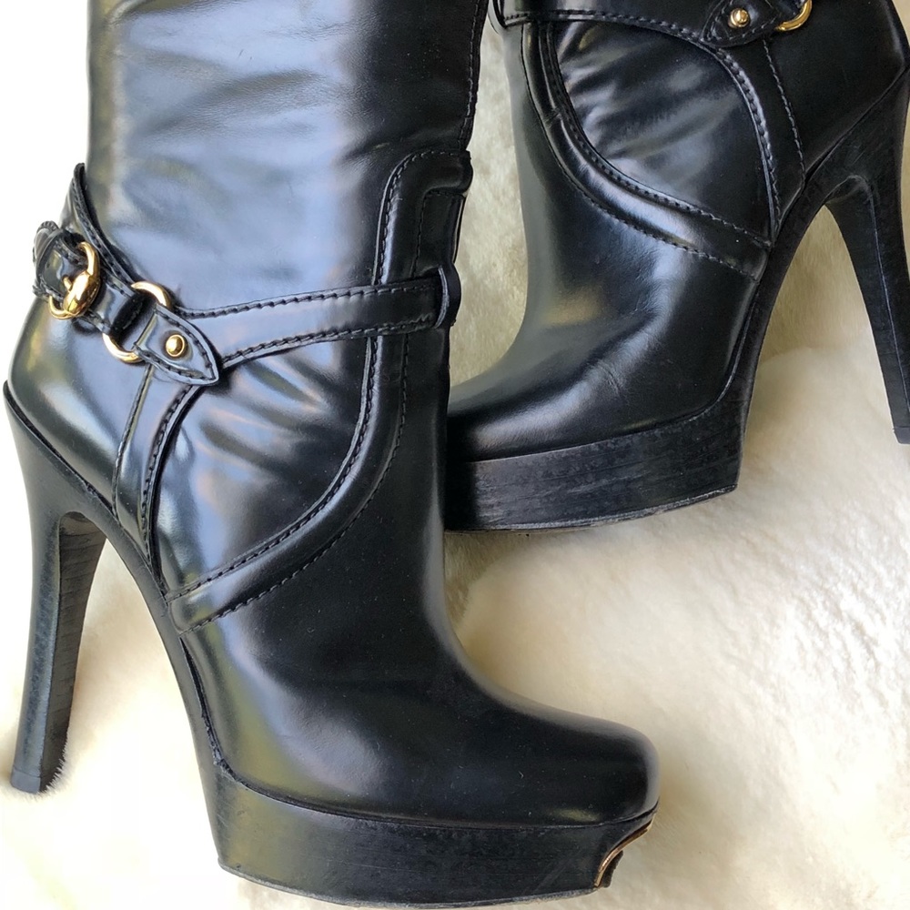 Gucci knee high leather boots.
